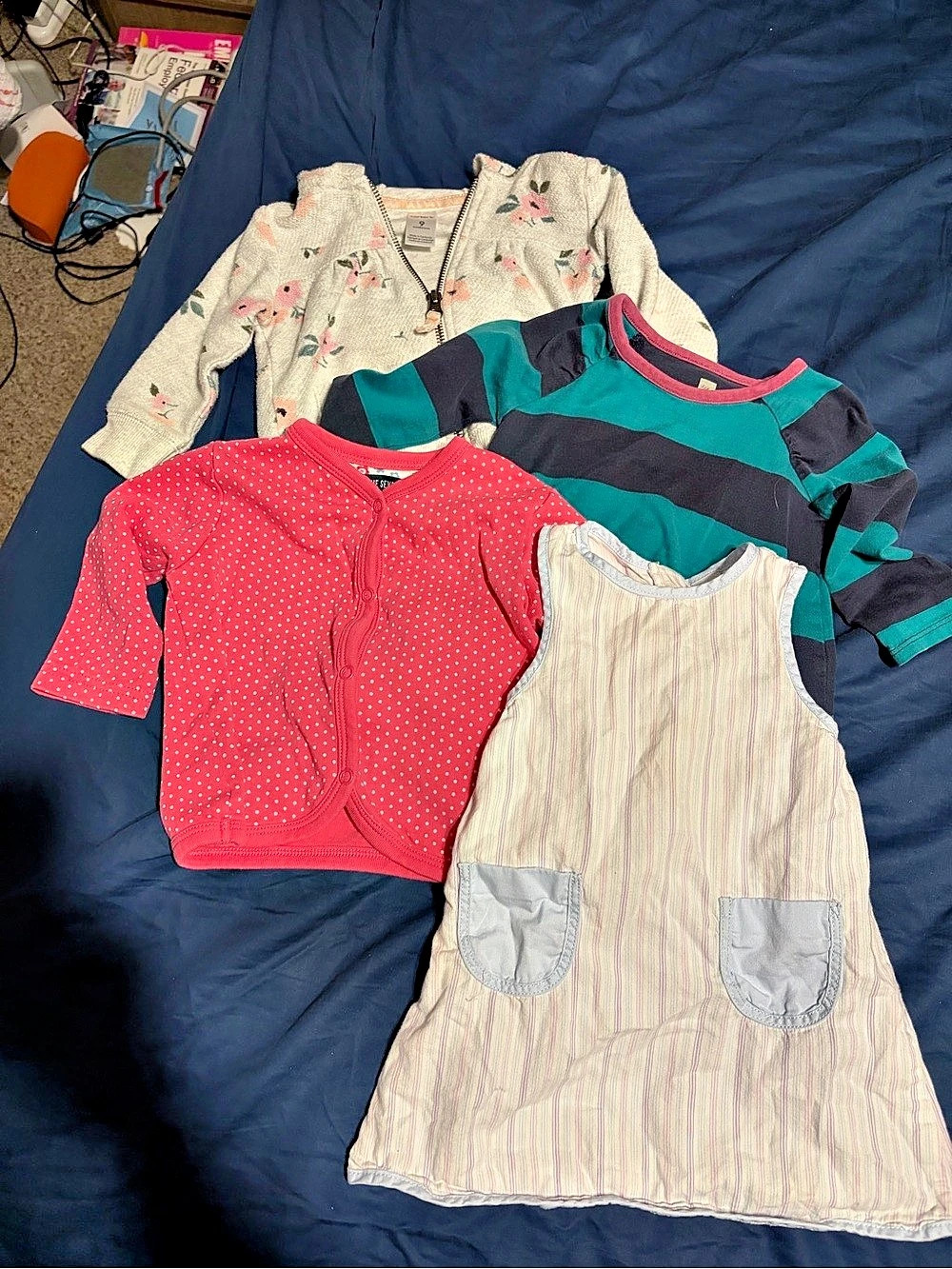 Baby girl bundle including top, dress and cardigan/jacket.